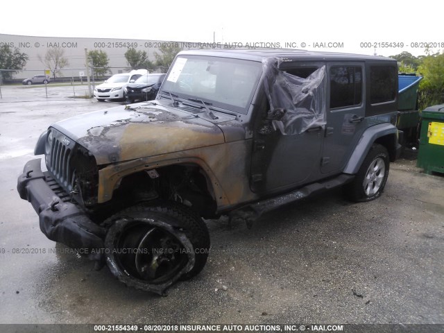 1C4HJWEG5EL160017 - 2014 JEEP WRANGLER UNLIMITE SAHARA GRAY photo 2