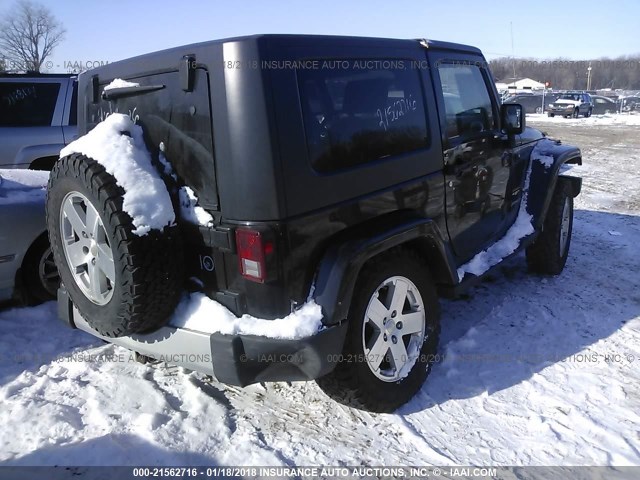 1J4FA54198L581865 - 2008 JEEP WRANGLER SAHARA BLACK photo 4