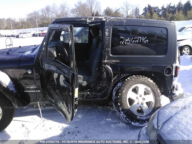 1J4FA54198L581865 - 2008 JEEP WRANGLER SAHARA BLACK photo 6