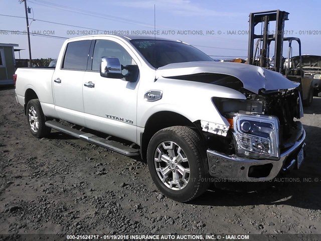 1N6AA1F44HN556079 - 2017 NISSAN TITAN XD SL/PRO-4X/PLAT RES/SV SILVER photo 1