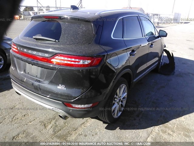 5LMCJ1A99FUJ47683 - 2015 LINCOLN MKC BLACK photo 4