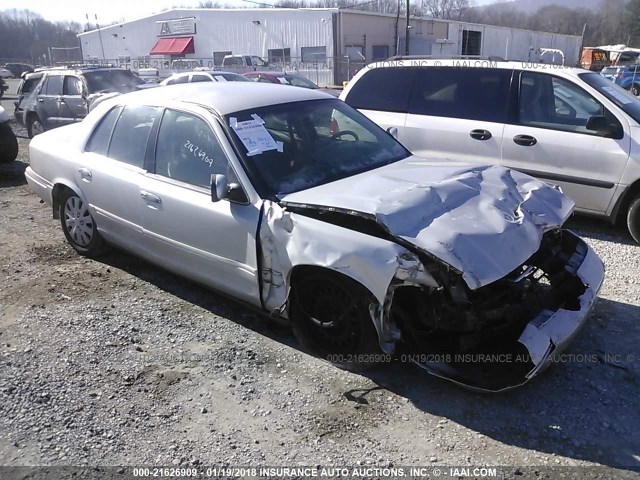 2MEFM74W5YX611370 - 2000 MERCURY GRAND MARQUIS GS SILVER photo 1