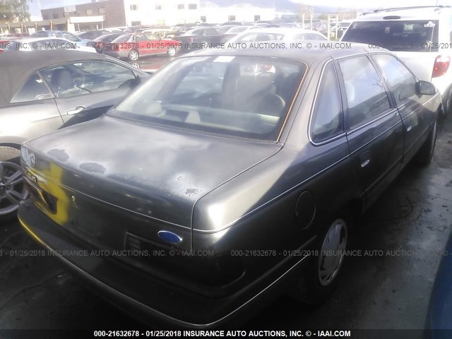 1FABP50U7KA147066 - 1989 FORD TAURUS L GRAY photo 4