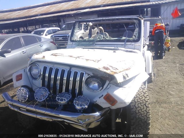 1J4FA59S6YP711420 - 2000 JEEP WRANGLER / TJ SAHARA WHITE photo 6