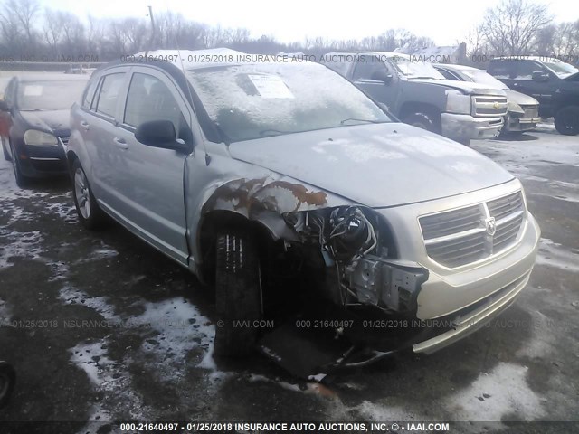 1B3CB3HA6BD238258 - 2011 DODGE CALIBER MAINSTREET SILVER photo 1