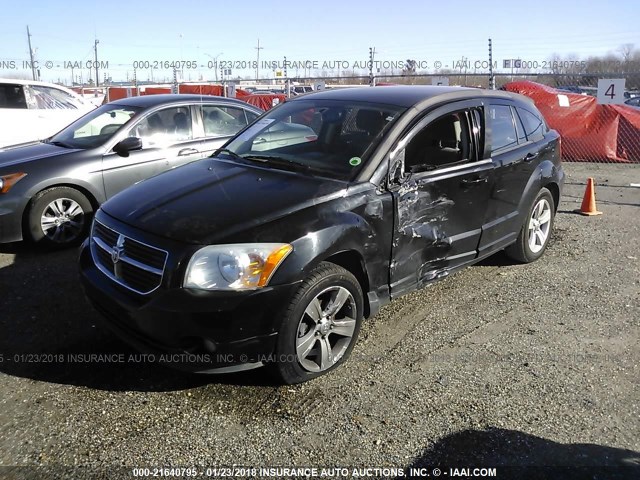 1B3CB3HA3BD118188 - 2011 DODGE CALIBER MAINSTREET BLACK photo 2