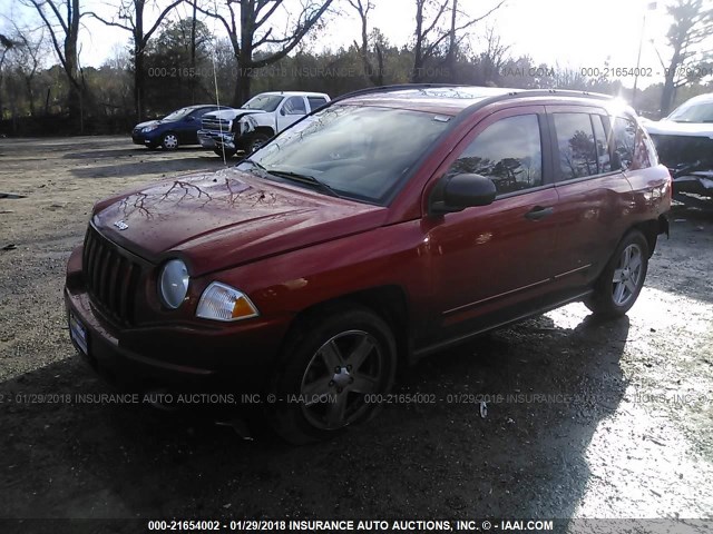 1J4FT47A39D196359 - 2009 JEEP COMPASS SPORT ORANGE photo 2