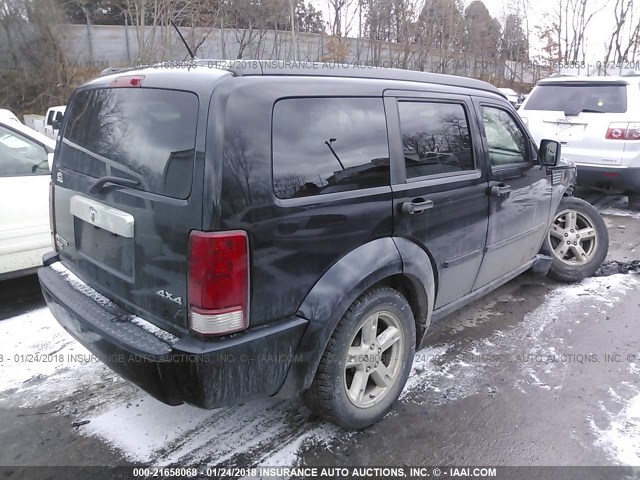 1D8GU58K57W654782 - 2007 DODGE NITRO SLT BLACK photo 4