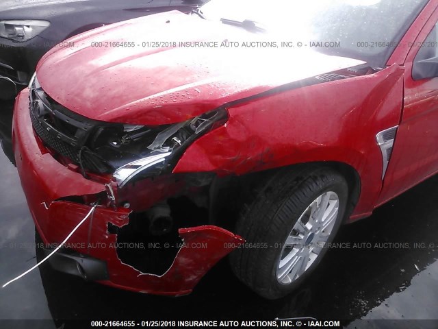 1FAHP33N48W208940 - 2008 FORD FOCUS SE/SEL/SES RED photo 6