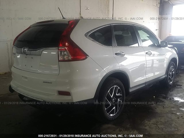 5J6RM3H45GL014208 - 2016 HONDA CR-V SE WHITE photo 4