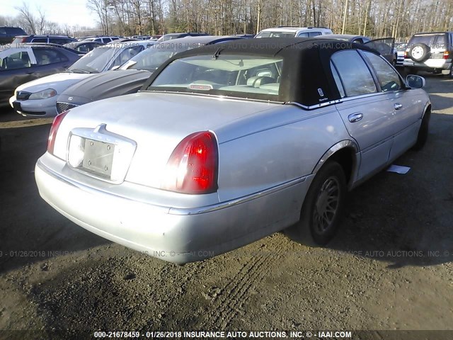 1LNHM82W7XY638566 - 1999 LINCOLN TOWN CAR SIGNATURE SILVER photo 4