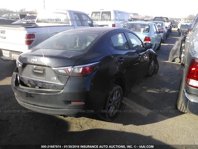 3MYDLBZV5GY129162 - 2016 TOYOTA SCION IA BLACK photo 4