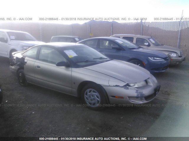 1G8ZP1287YZ127423 - 2000 SATURN SC1 GOLD photo 1