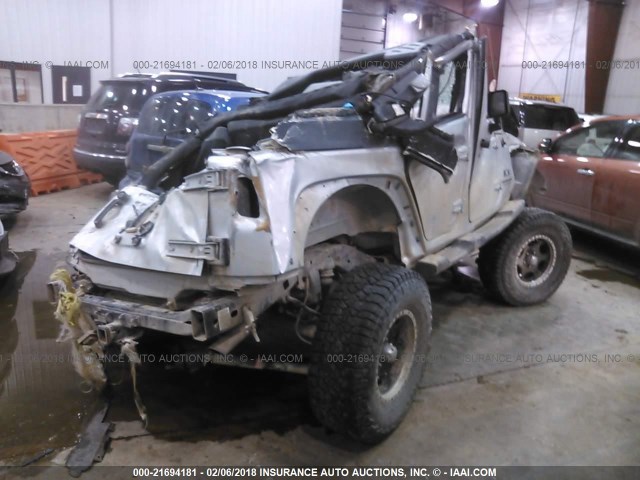 1J4GA39179L752874 - 2009 JEEP WRANGLER UNLIMITE X SILVER photo 4