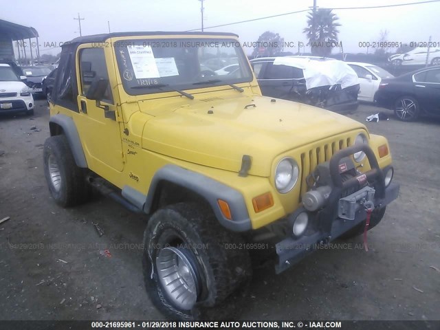 1J4FA49S5YP763857 - 2000 JEEP WRANGLER / TJ SPORT YELLOW photo 1