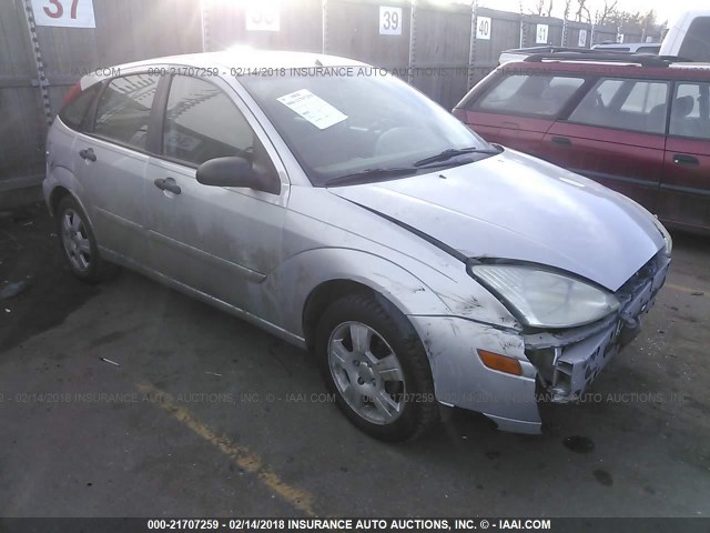 3FAHP37384R124836 - 2004 FORD FOCUS ZX5 SILVER photo 1