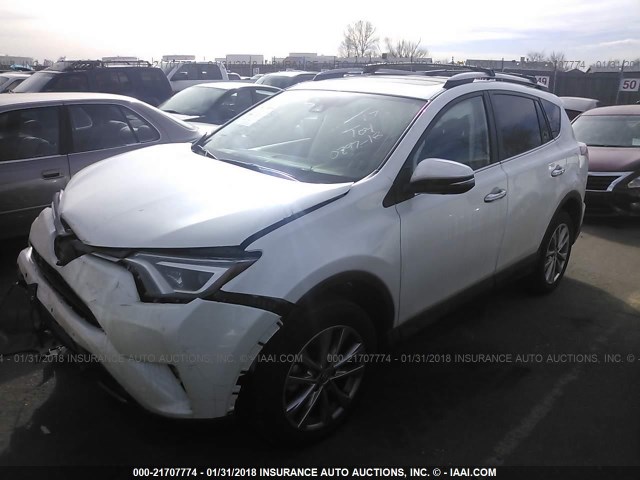 2T3DFREV6HW545846 - 2017 TOYOTA RAV4 LIMITED/SE/PLATINUM WHITE photo 2