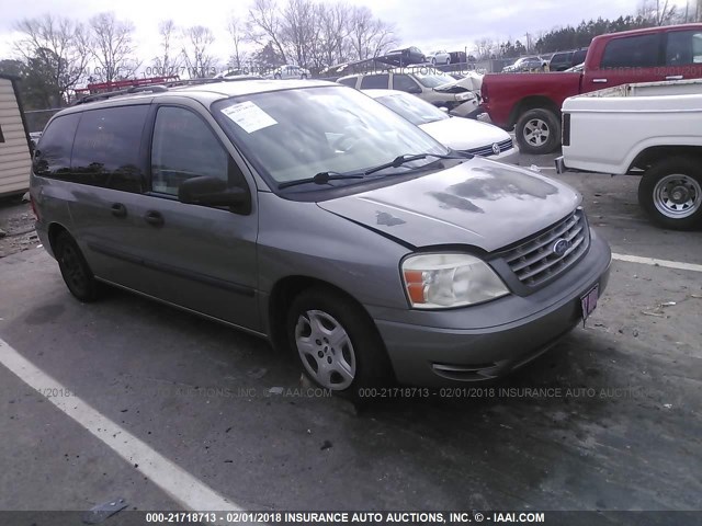 2FMZA51644BA70153 - 2004 FORD FREESTAR SE GRAY photo 1