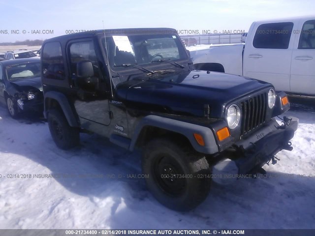 1J4FA49S84P769047 - 2004 JEEP WRANGLER / TJ SPORT BLACK photo 1