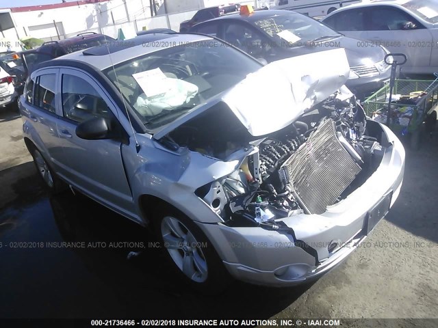 1B3CB3HA2BD257020 - 2011 DODGE CALIBER MAINSTREET SILVER photo 1