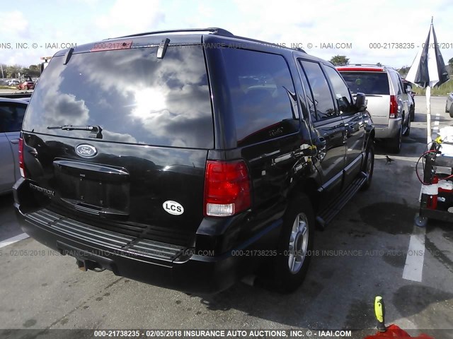 1FMRU15W13LA06130 - 2003 FORD EXPEDITION XLT BLACK photo 4