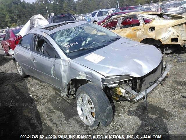 1G2ZG528954114974 - 2005 PONTIAC G6 SILVER photo 1