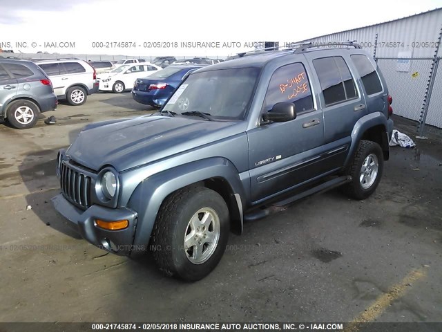 1J4GL58K72W139478 - 2002 JEEP LIBERTY LIMITED BLUE photo 2