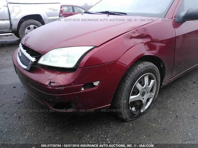 1FAFP34N85W318584 - 2005 FORD FOCUS ZX4 RED photo 6
