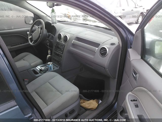 1FMZK05135GA30395 - 2005 FORD FREESTYLE SEL BLUE photo 5