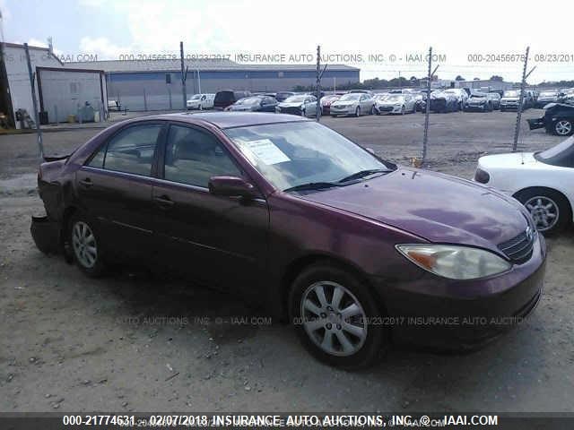 4T1BF32KX2U005558 - 2002 TOYOTA CAMRY LE/XLE/SE RED photo 1