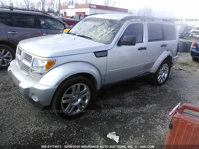 1D4PT4GK0BW599697 - 2011 DODGE NITRO HEAT SILVER photo 2