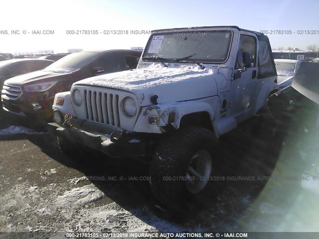 1J4FA59S6YP729321 - 2000 JEEP WRANGLER / TJ SAHARA WHITE photo 2