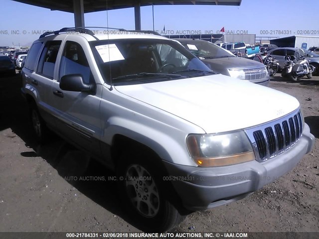 1J4G258S2XC587199 - 1999 JEEP GRAND CHEROKEE LAREDO TAN photo 1