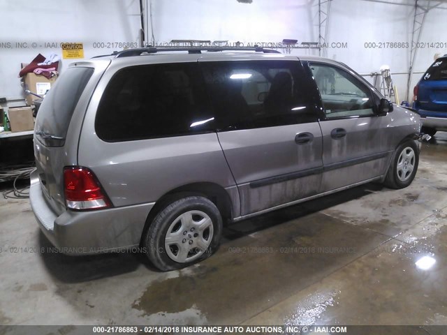 2FMZA51604BA11388 - 2004 FORD FREESTAR SE GOLD photo 4