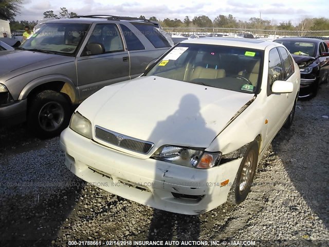 JNKCP11A7XT018931 - 1999 INFINITI G20 WHITE photo 6