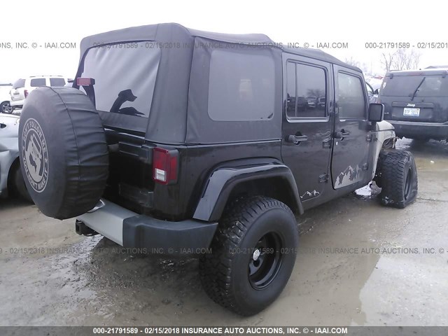 1J4BA5H17AL147376 - 2010 JEEP WRANGLER UNLIMITE SAHARA BLACK photo 4