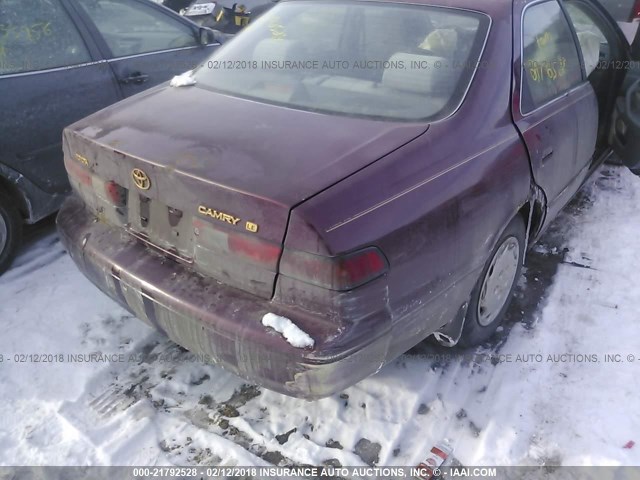 JT2BG22K9V0043332 - 1997 TOYOTA CAMRY LE/XLE MAROON photo 4