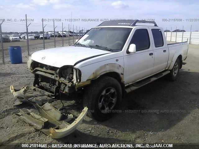 1N6ED29X74C429272 - 2004 NISSAN FRONTIER CREW CAB XE V6 WHITE photo 2