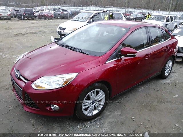 1FAHP3H26CL313908 - 2012 FORD FOCUS SEL RED photo 2