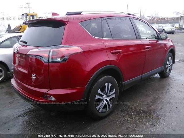 JTMBFREV0GJ076340 - 2016 TOYOTA RAV4 LE RED photo 4