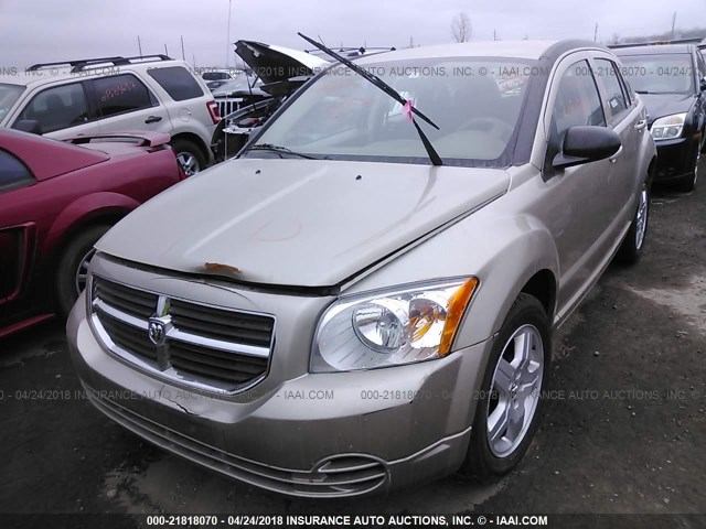 1B3HB48A09D238133 - 2009 DODGE CALIBER SXT GOLD photo 2