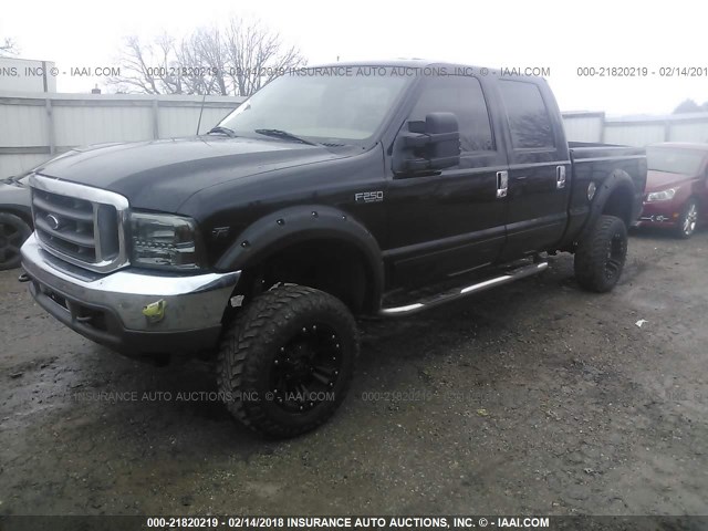 1FTNW21S01EB68578 - 2001 FORD F250 SUPER DUTY BLACK photo 2