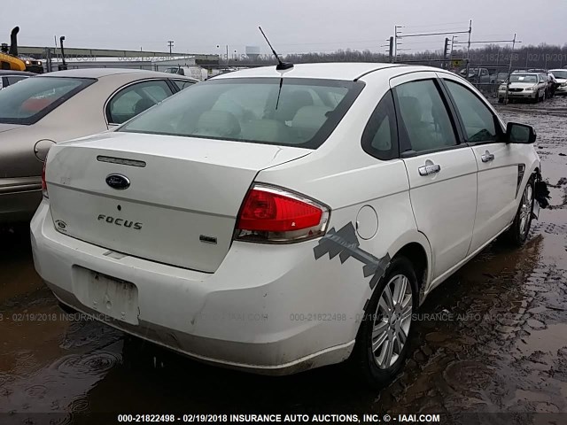 1FAHP37N29W111506 - 2009 FORD FOCUS SEL WHITE photo 4