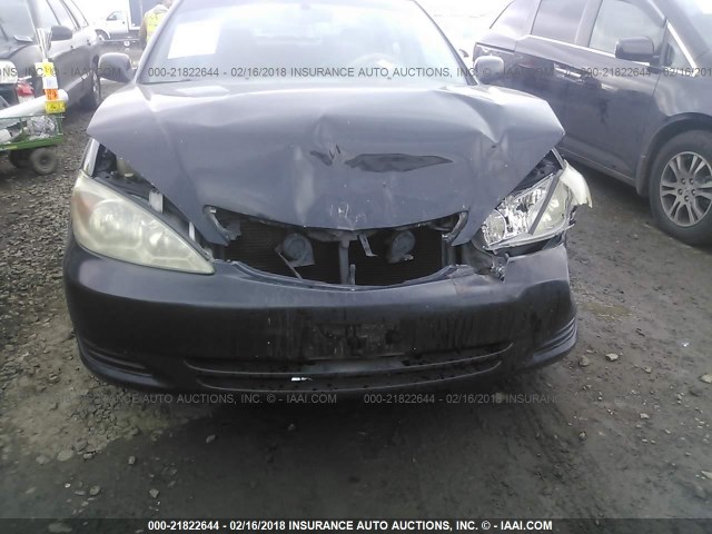 4T1BF30K42U002464 - 2002 TOYOTA CAMRY LE/XLE/SE BLACK photo 6