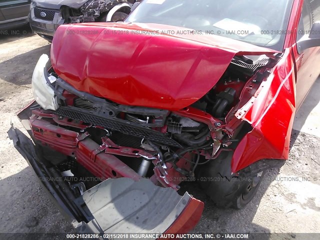 1FAHP35N08W140391 - 2008 FORD FOCUS SE/SEL/SES RED photo 6