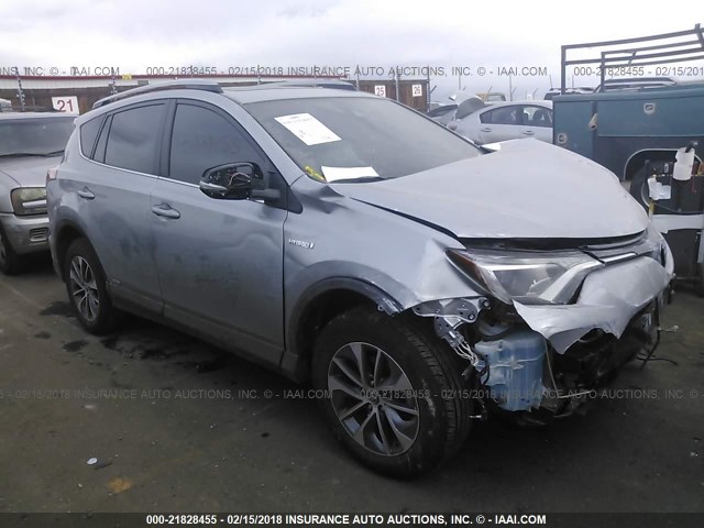 JTMRJREV3HD103799 - 2017 TOYOTA RAV4 HV LE/XLE SILVER photo 1