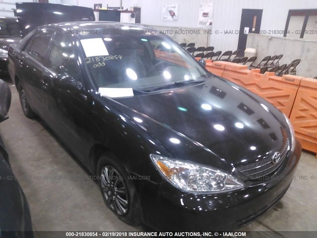 4T1BE32K45U011752 - 2005 TOYOTA CAMRY LE/XLE/SE BLACK photo 1