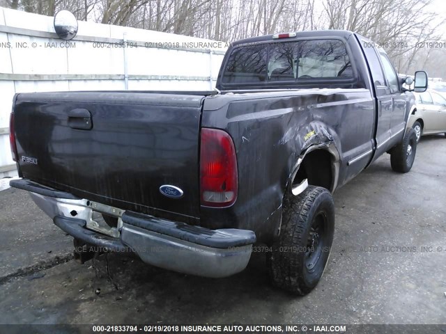 1FTSW31F0XEB14699 - 1999 FORD F350 SRW SUPER DUTY BLACK photo 4