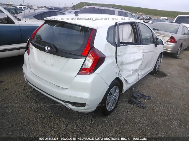 3HGGK5H42JM702849 - 2018 HONDA FIT LX WHITE photo 4