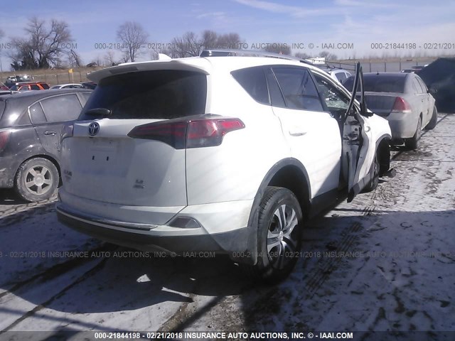 JTMBFREVXHJ144578 - 2017 TOYOTA RAV4 LE WHITE photo 4